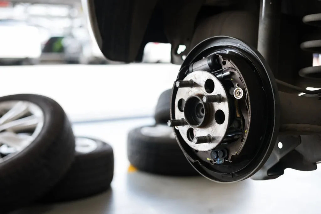 Exposed wheel hub assembly in auto shop — wheel bearing repair cost